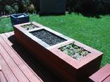 Built In Firepit with side planters
