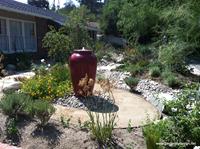 The Dry Stream is connected to the rain gutters and only flows when it rains